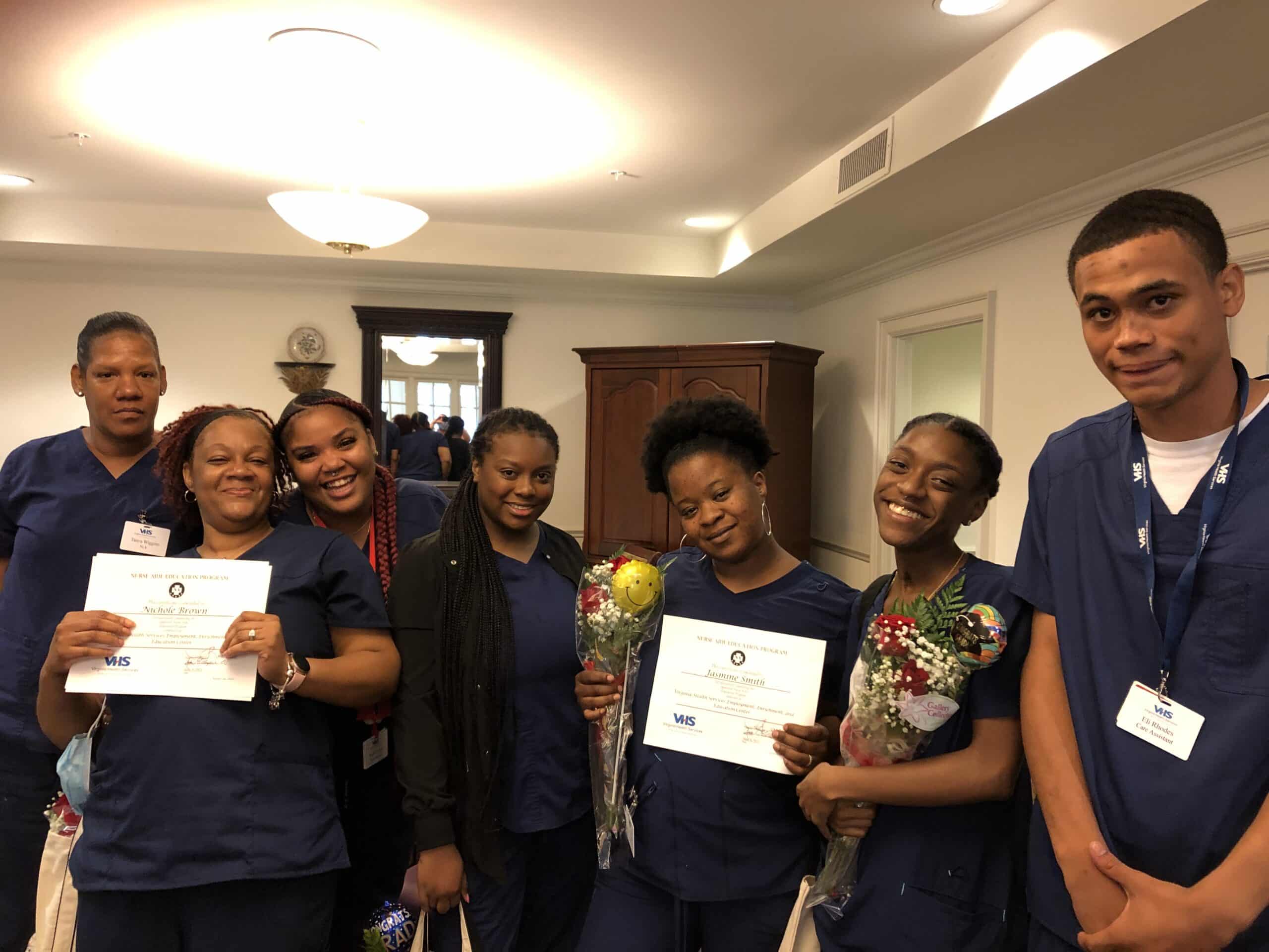 The second cohort of Virginia Health Services apprenticeship program graduates gather for a ceremony June 4, 2021.