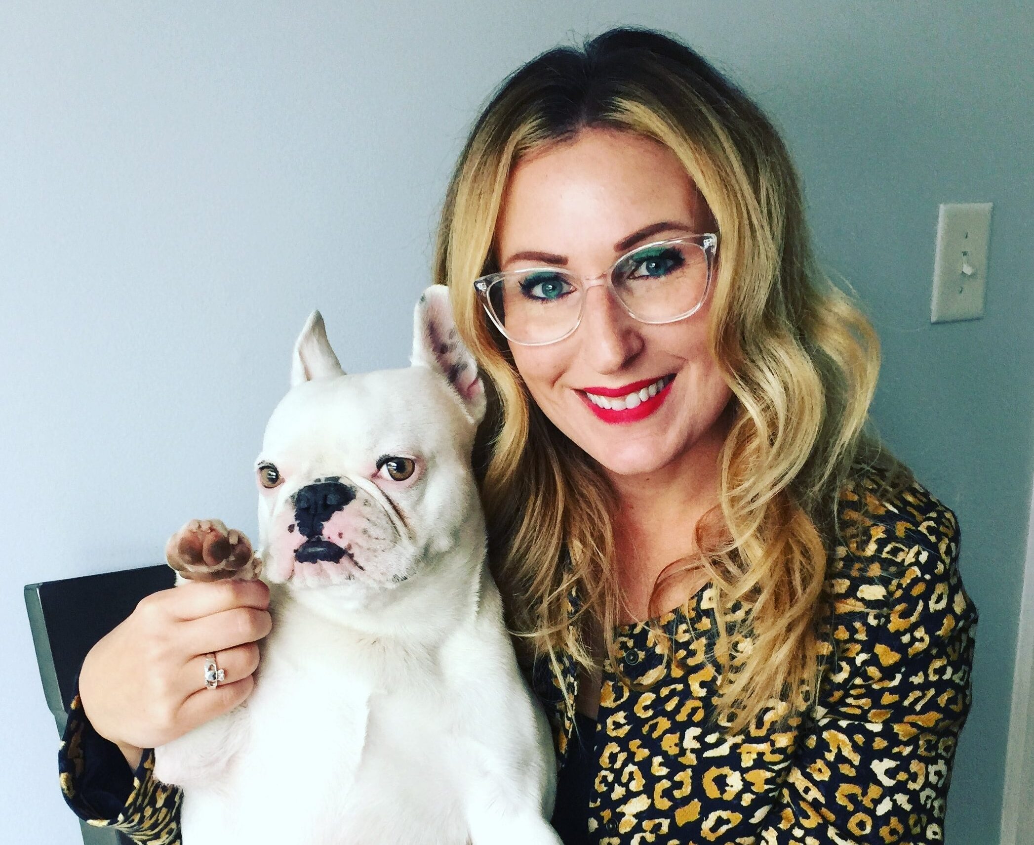 Virginia Health Services recruiter Colleen Reynolds with her French bulldog.