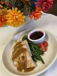 plated turkey dinner with mashed potatoes