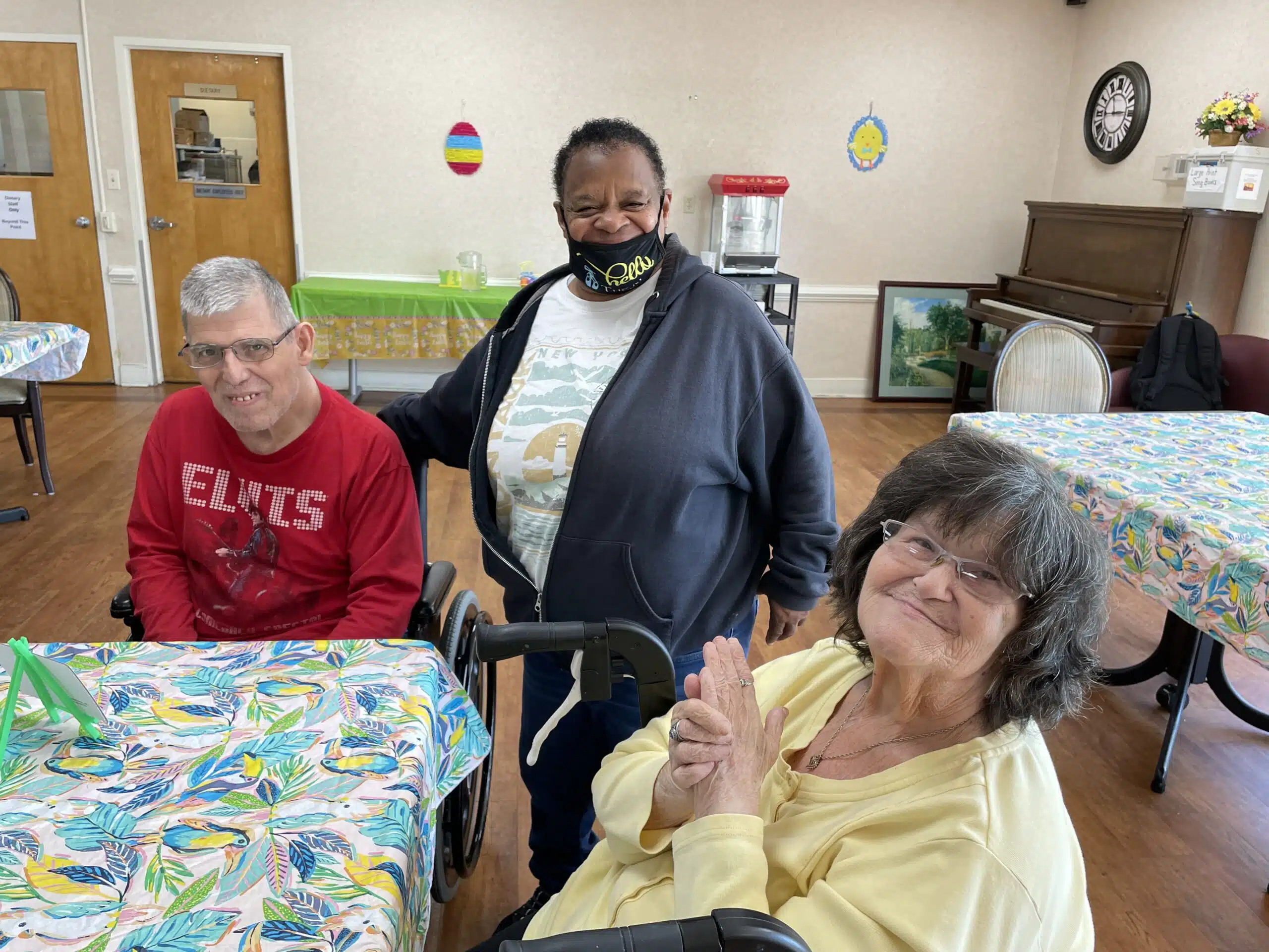 Lancashire volunteer Joyce Taylor and two Residents enjoy a morning craft.