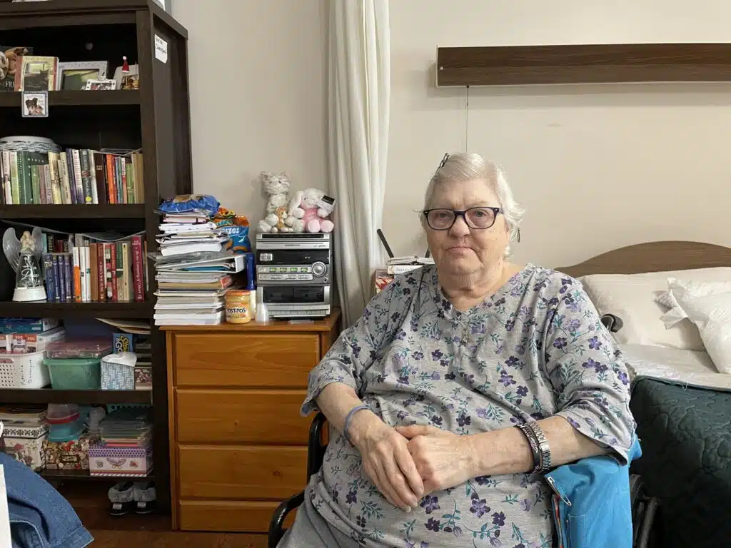 Patricia Davenport has a stuffed kitty on her bed.