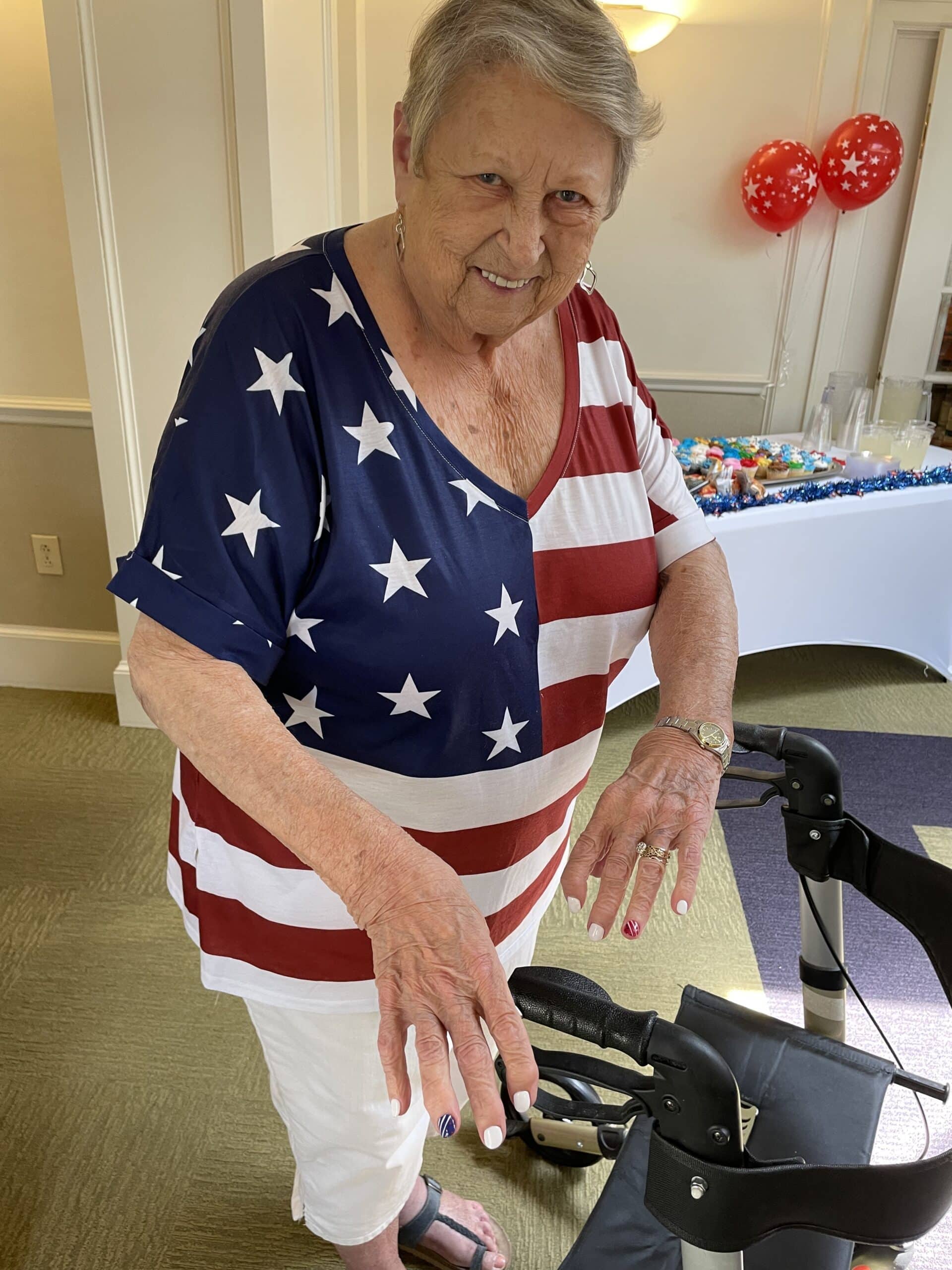Arbors resident Fae shows off her patriotic nails