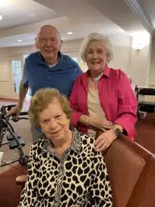 Portrait of Marshall, Joyce and Sally, who all went to school together growing up.