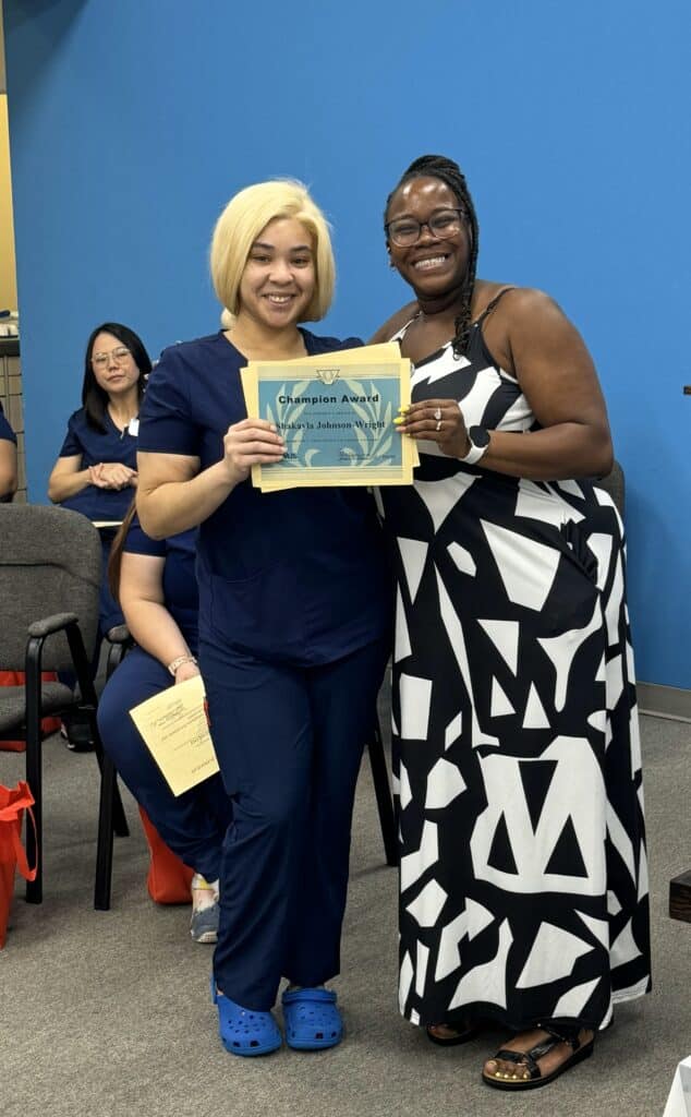 Champion Award recipient Shakayla Johnson-Wright with Princess Henderson.