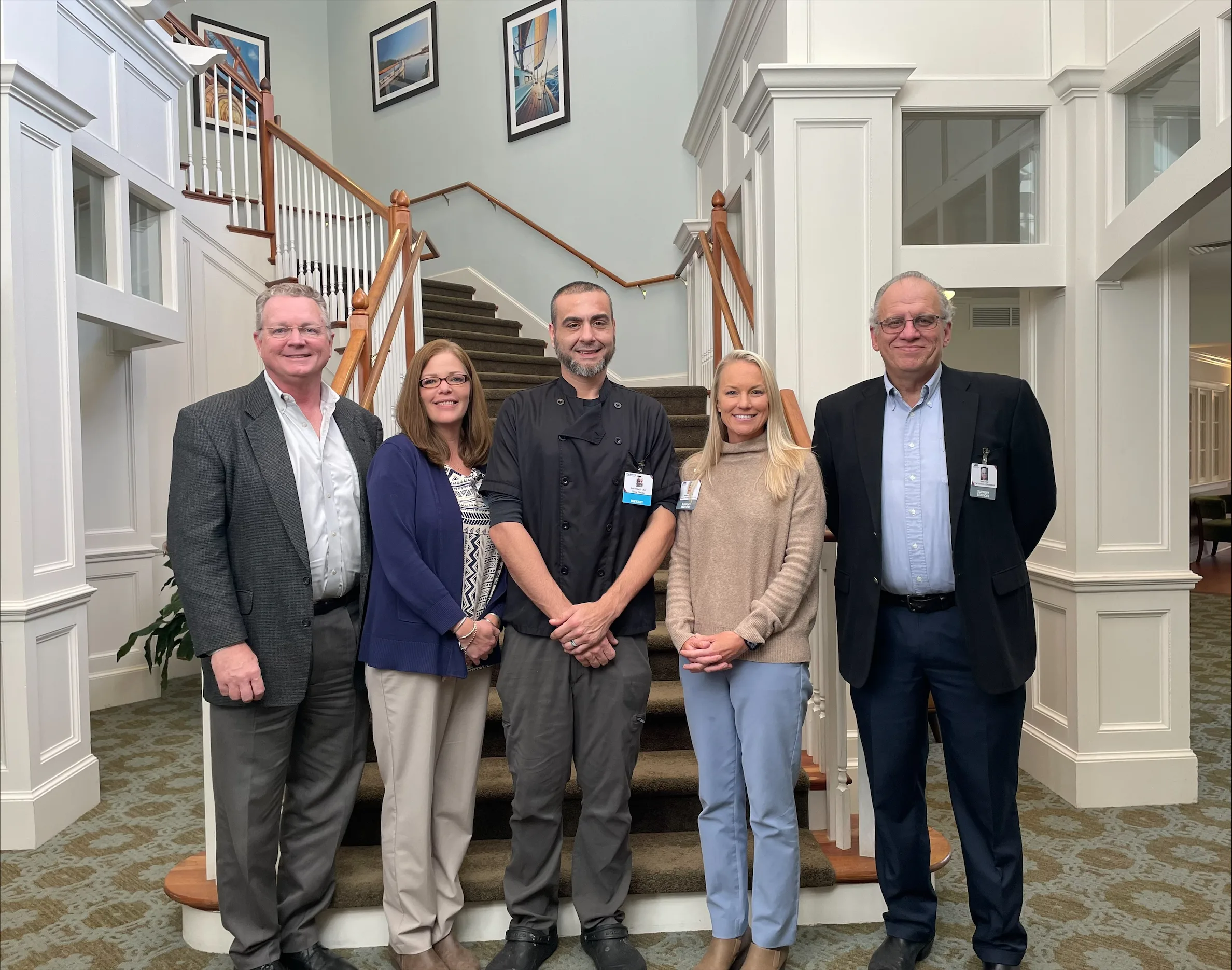 Group photo from Josh's promotion. Pictured are VHS Vice President of Operations Don Lundin, Arbors Director Amanda Lehto, Executive Chef Josh Pittock, Executive Director of Senior Living Stephanie Johnston and Vice President of Facilities and Development Jesse Young.