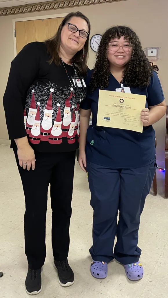 Instructor Tracy Williams and valedictorian Angelique Wade.