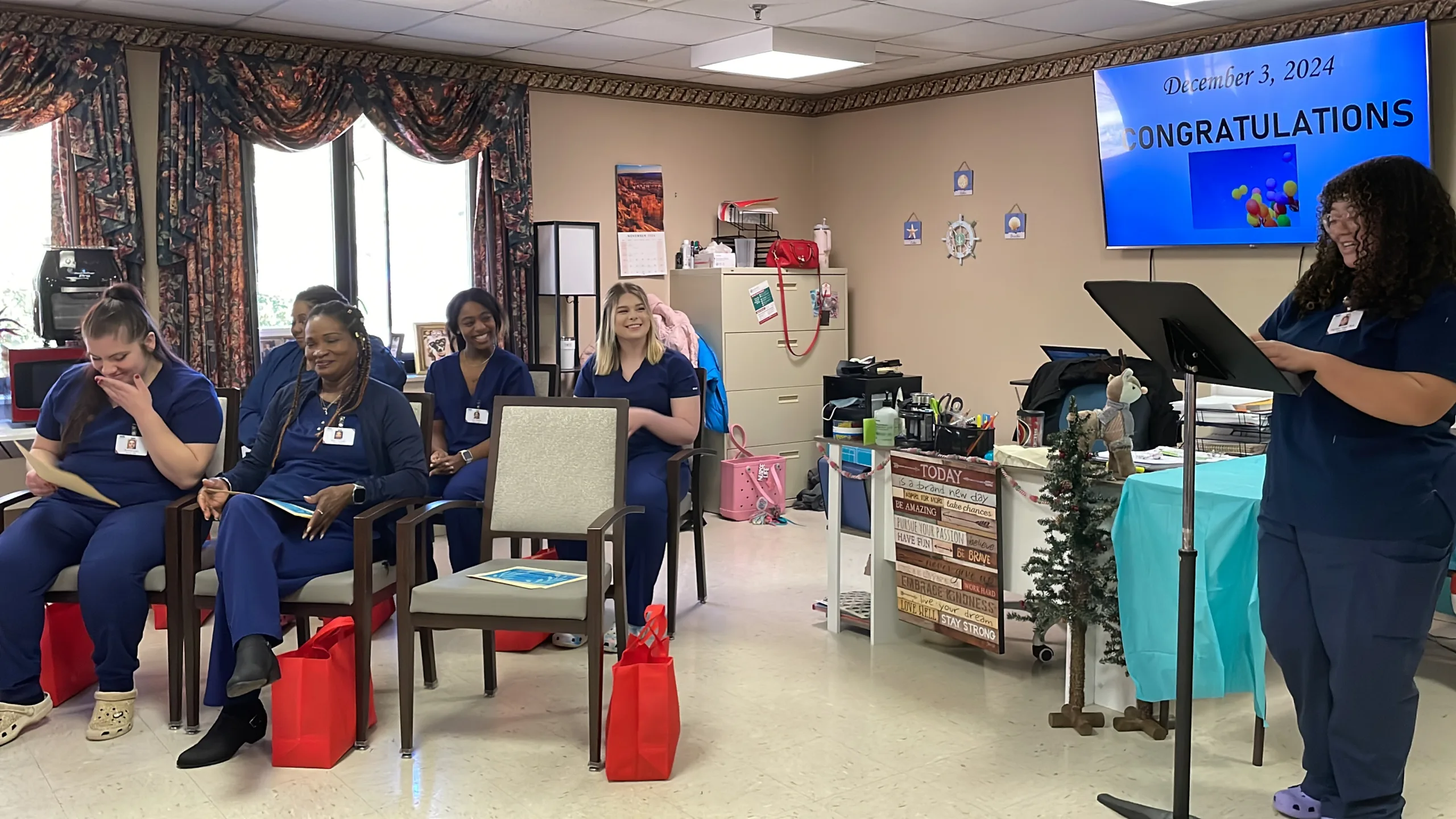 Valedictorian Angelique Wade addresses her classmates, instructors, family and friends during a graduation ceremony Dec. 3, 2024, at Walter Reed Nursing and Rehabilitation Center.