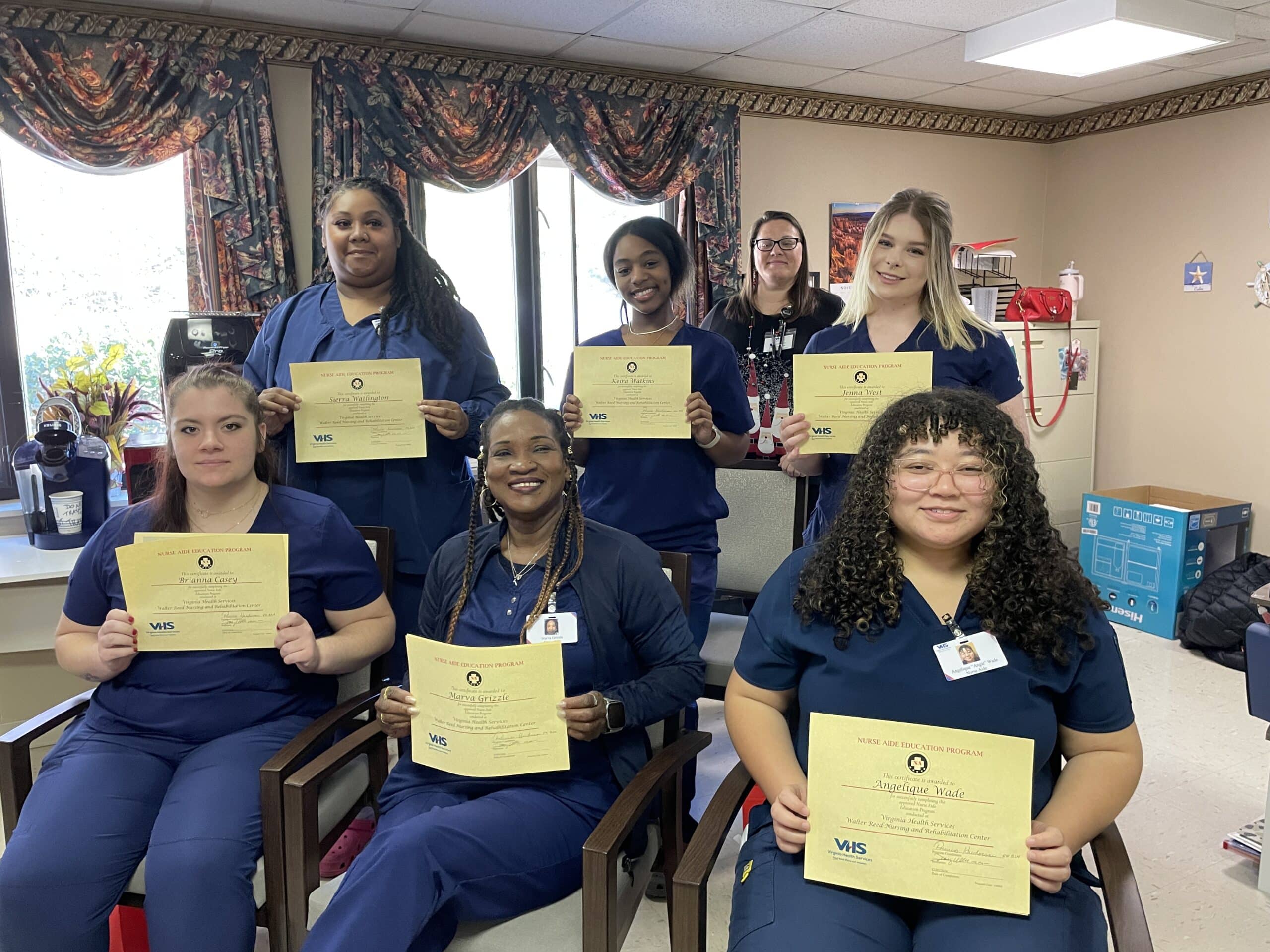 Six graduated from Care Assistants to Nurse Aides from the apprenticeship program at Walter Reed Nursing and Rehabilitation Center on December 3, 2024.