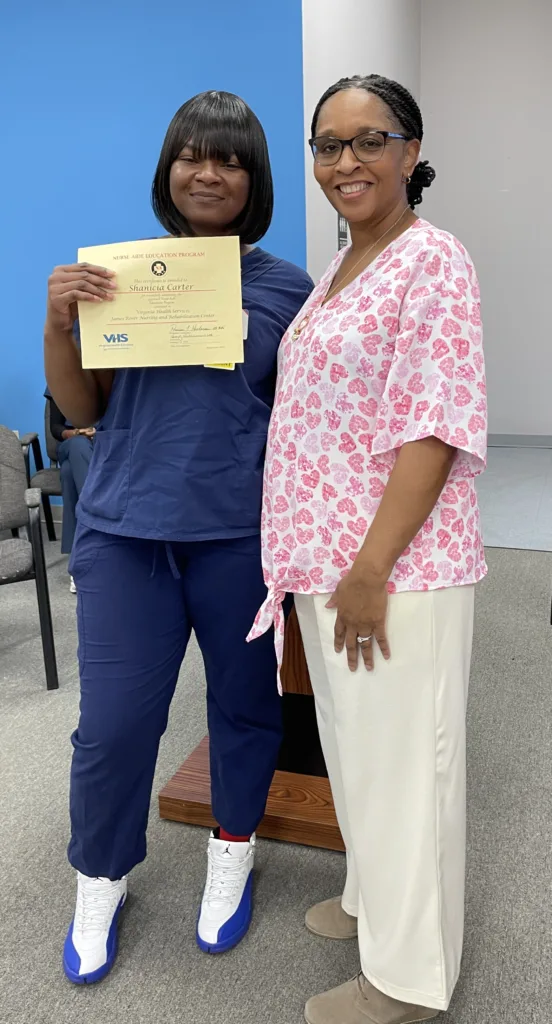 Portrait of Shanicia Carter and instructor Terry Williamson