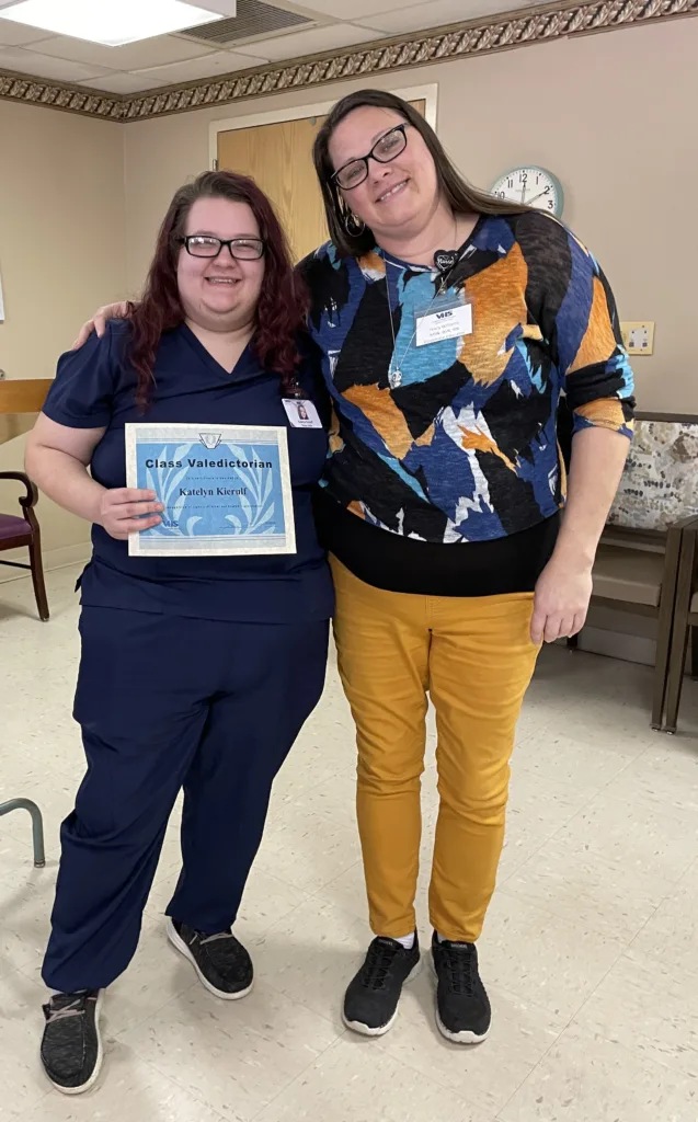 Portrait of valedictorian Katelyn Kierulf and instructor Tracy Williams.