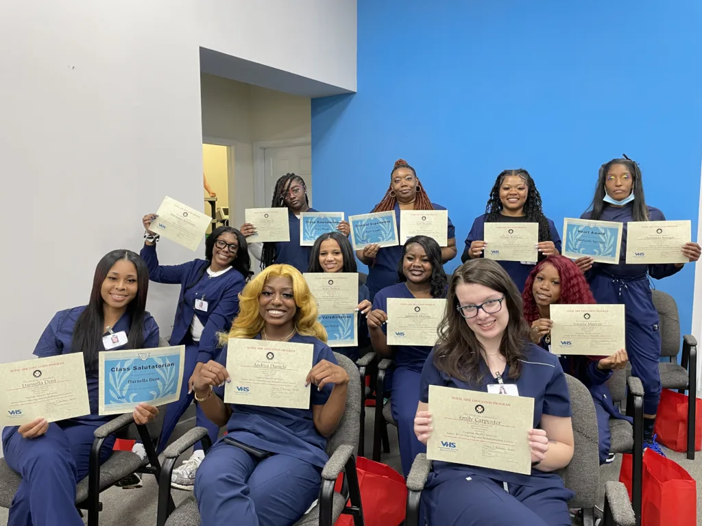 Group of apprentice program graduates at a ceremony April 17, 2025.